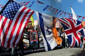 Hezbollah (or maybe al-Nusra) burn the flags of all the Satans.