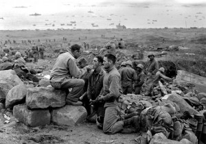 Marines receiving Holy Communion during a lull in the Battle of Iwo Jima. (Photo: Wikipedia)