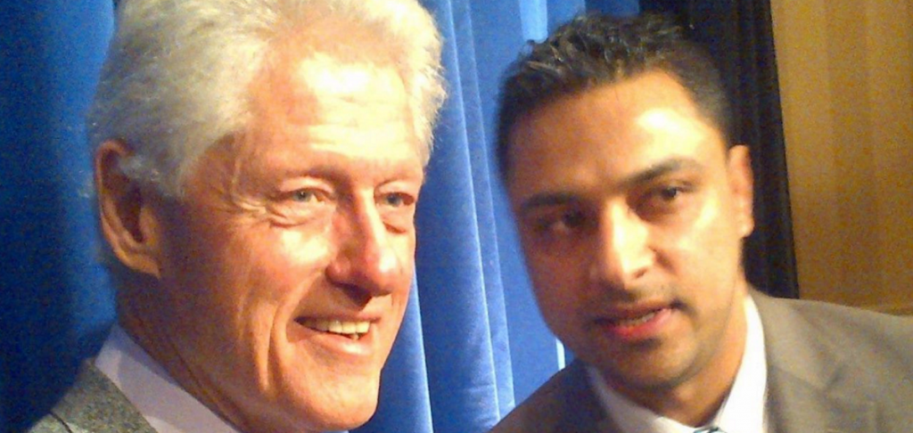 Imran Awan with Bill Clinton. (Facebook)