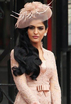 Looking veddy, veddy British, Saudi Arabian Princess Ameerah al-Taweel strikes quiet the pose.